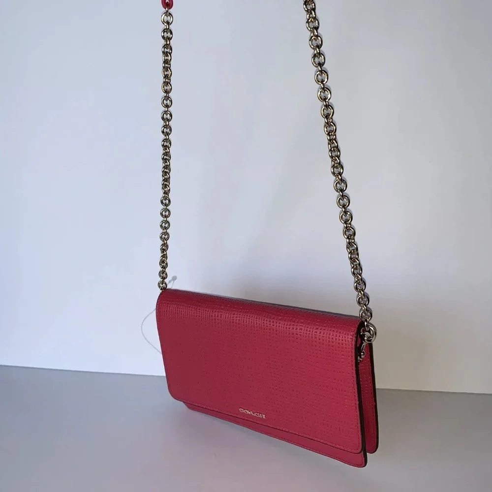 Coach details embossed